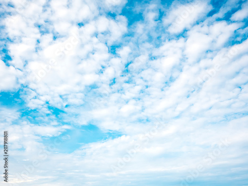 Summer time blue sky background with tiny cloud