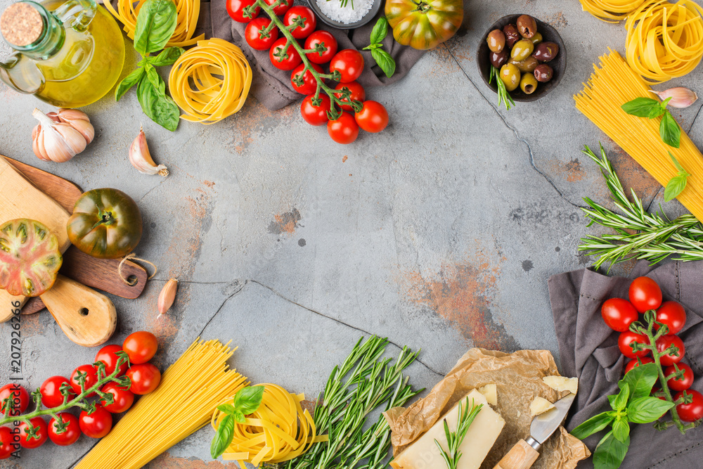 Italian food ingredients with pasta, tomatoes, cheese, olive oil, basil Italian food ingredients with pasta, tomatoes, cheese, olive oil, basil