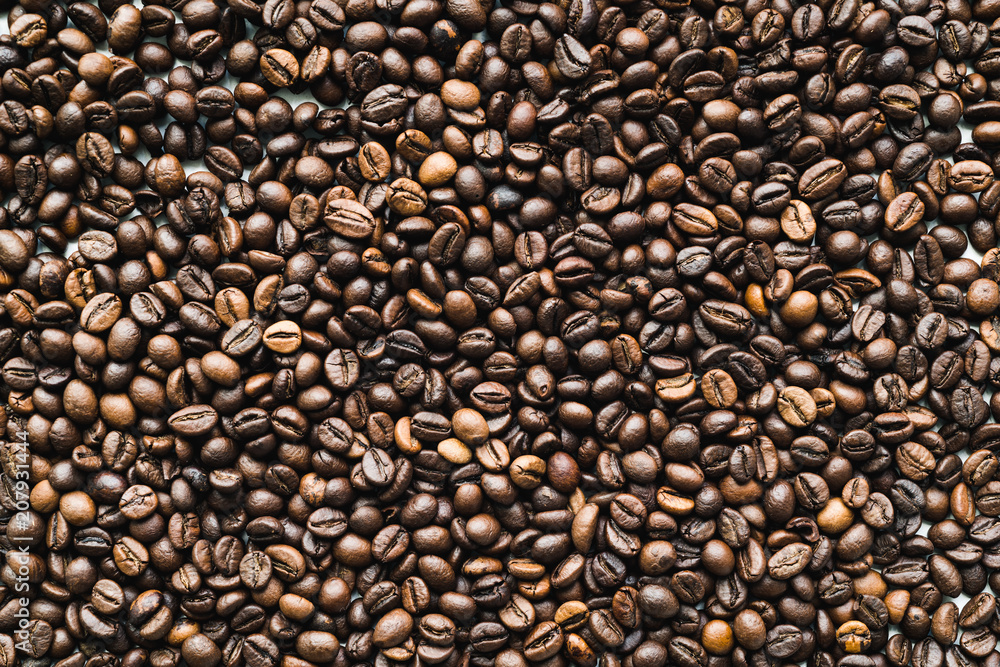 Fototapeta premium Top view of the surface with coffee beans