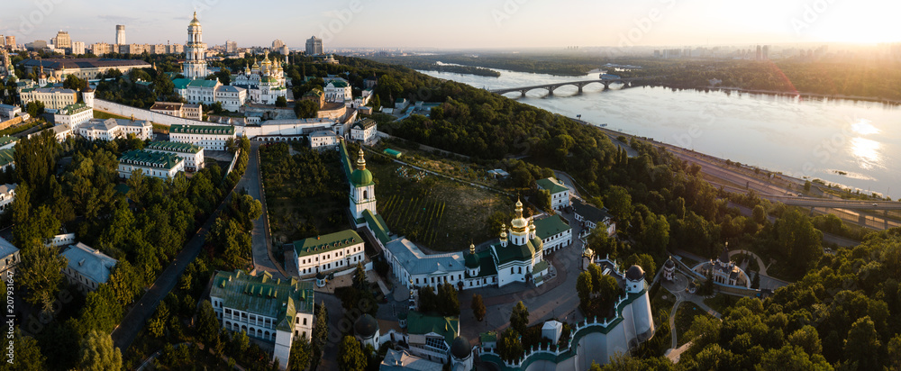 Aerial panoramic view of Kiev Pechersk Lavra churches on hills from above, cityscape of Kyiv city