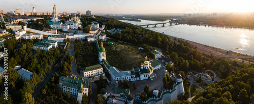 Aerial panoramic view of Kiev Pechersk Lavra churches on hills from above, cityscape of Kyiv city © bartoshd