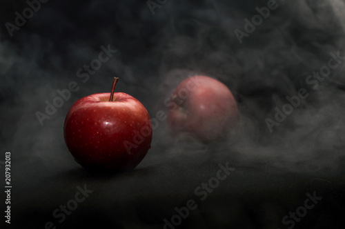 Red Apple on smoke black background