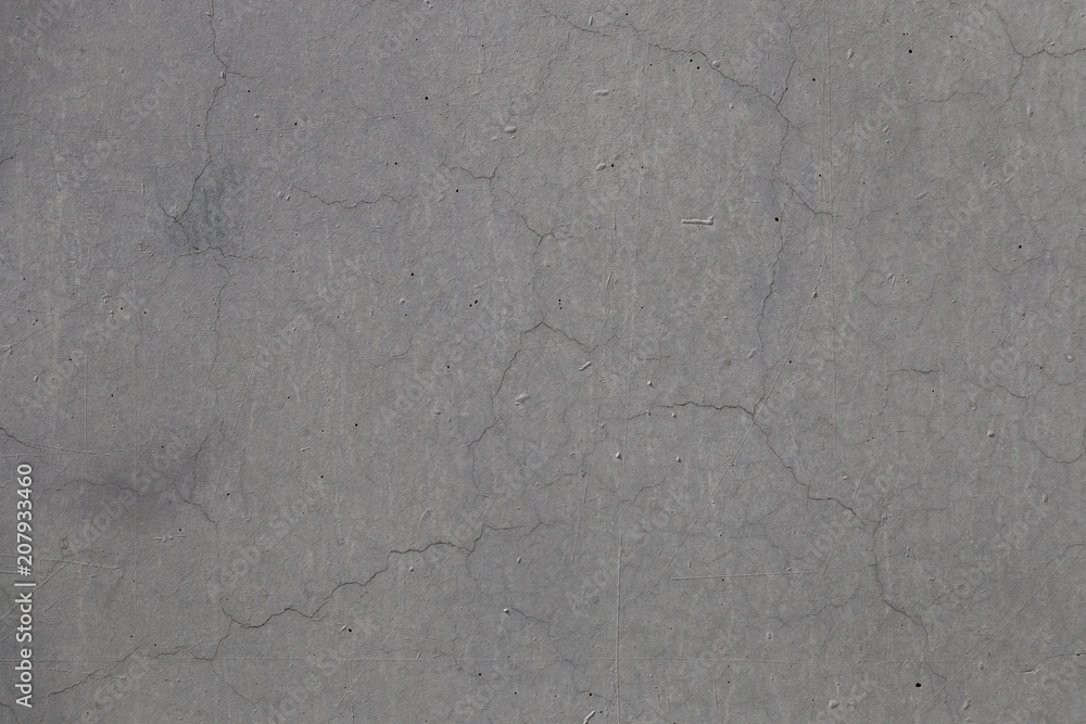 Naklejka premium Gray concrete wall texture. Cement floor background with fine grain and scratches