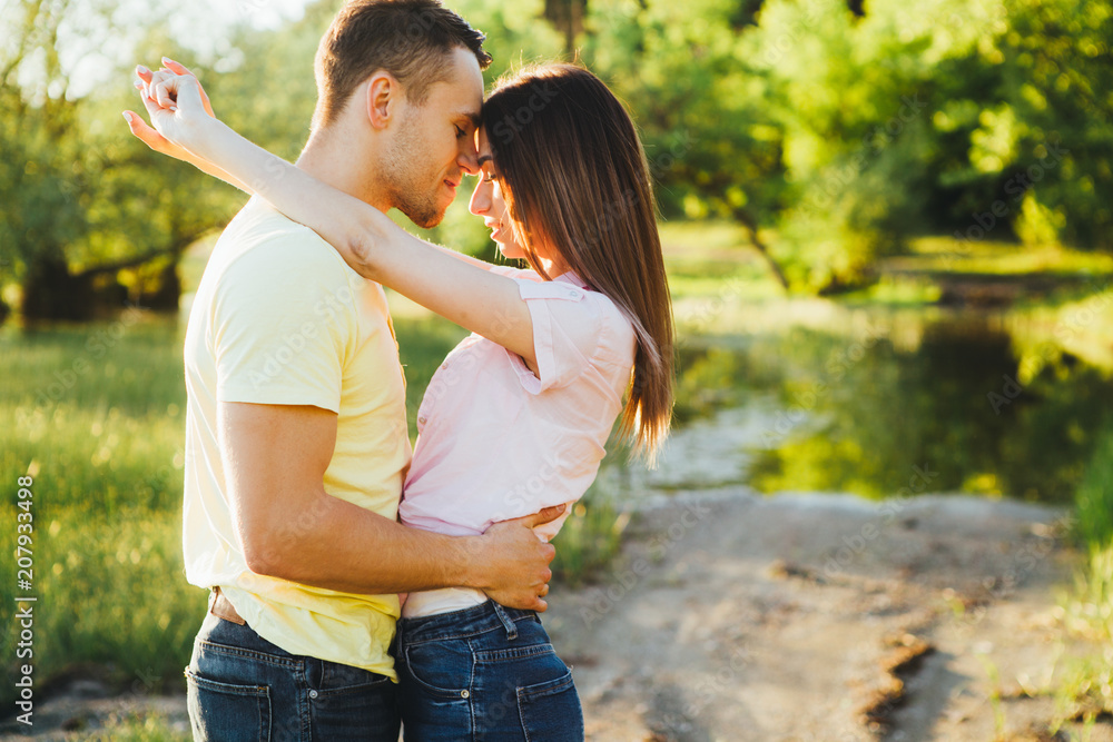 Shot of a young couple bonding trough walking in the nature. Shot of a young couple bonding trough walking in the nature.