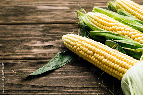 corn cob, wooden background, top view, agriculture