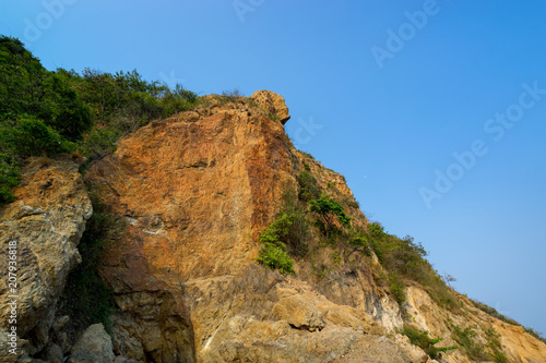 mountain climb on clearly blue sky background