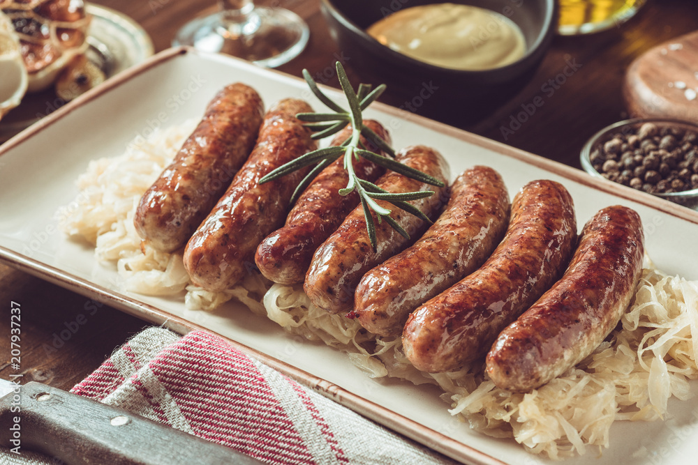 Traditional German Grilled Sausages with Cabbage Salad, Mustard and Beer