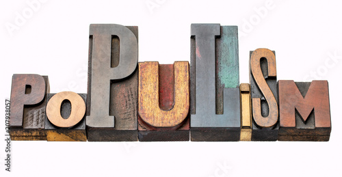 populism word abstract in wood type photo