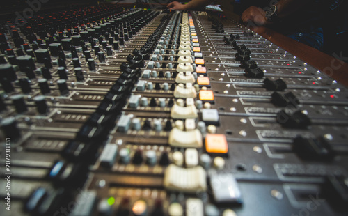 Wallpaper Mural Hand of the mixing engineer on the audio console Torontodigital.ca