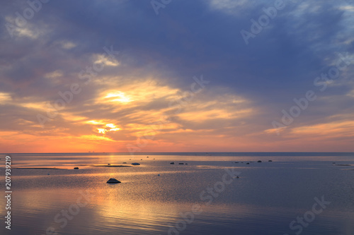 Baltic sea - early morning golden sunrise over the sea. Kurzeme  Latvia