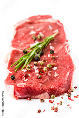 Raw beef steak ready to be cooked isolated on white background