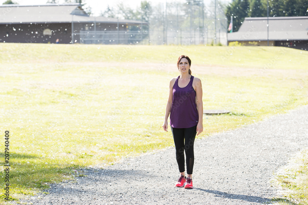 Fototapeta premium Active woman resting during a run