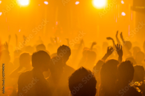 blurred light in night club party festival with crowd of people for background  © kowit1982