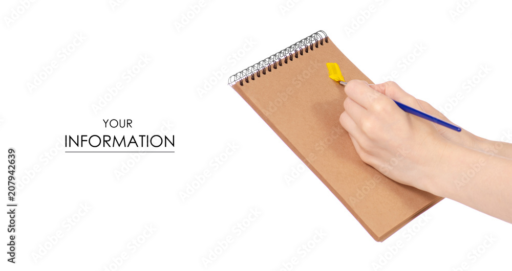 Notepad for drawing and paint brush in hand pattern on white background isolation Notepad for drawing and paint brush in hand pattern on white background isolation