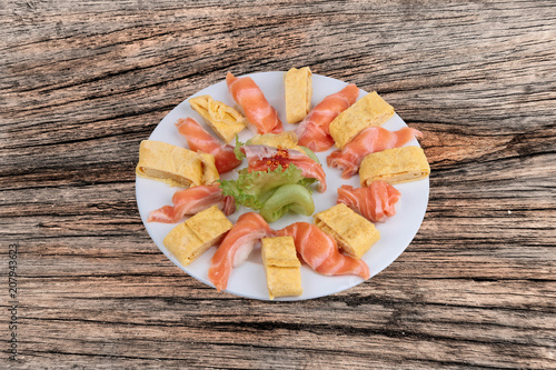 Salmon sushi ,Japanese Rolled Omelette as Tamagoyaki and salmon salad topped chili .