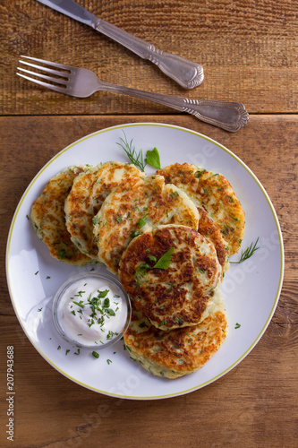 Herb and Cheese Mashed Potato Cakes. Potato Pancakes. Vegetable fritters. View from above, top studio shot