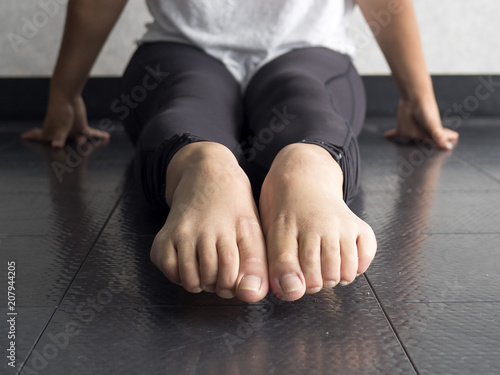 Close up of Dancer's pointed bare feet in the dance studio