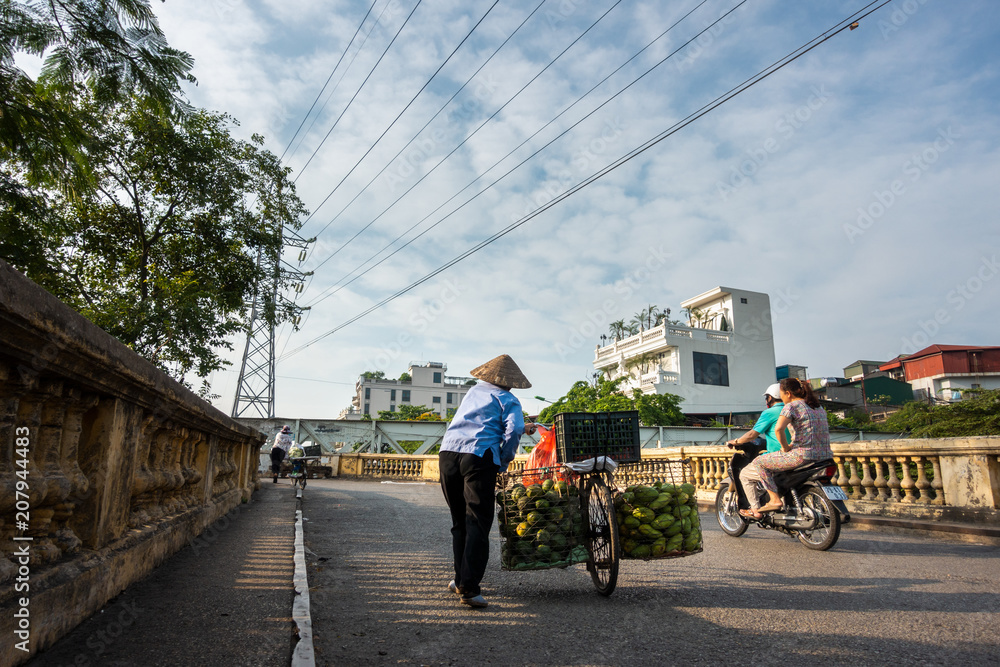 The street vendor in early morning in Hanoi, capital of Vietnam