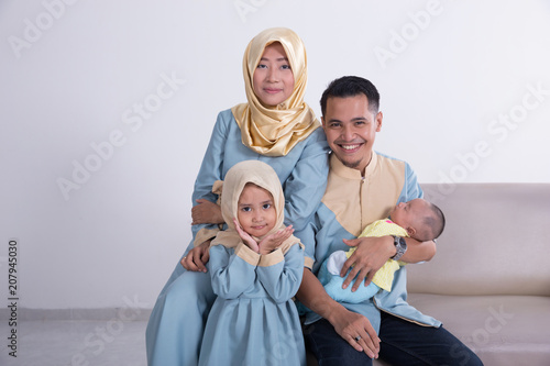 beautiful muslim family with kids together