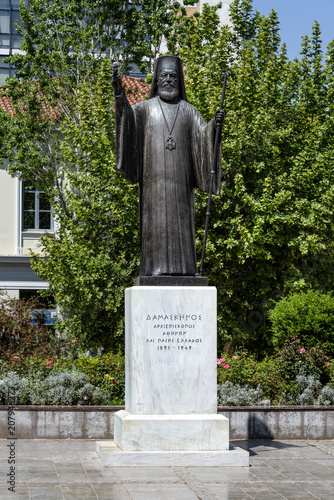 Greece, Athens: Statue of Archbishop Damaskinos Papandreou Damaskinos opposite the famous Metropolitan Cathedral of Athens in the city center of the Greek capital - concept remembrance history