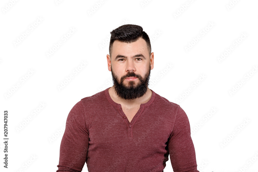 young serious bearded man isolated on white background young serious bearded man isolated on white background