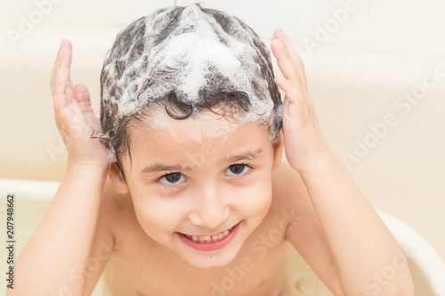boy 4 years old bathed in the bathroom
