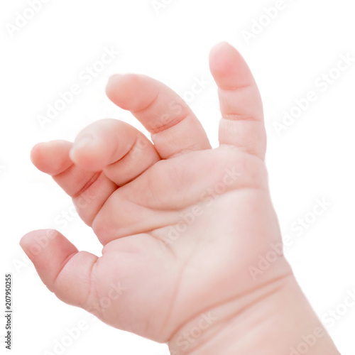closeup of newborn baby hand isolated on white background.