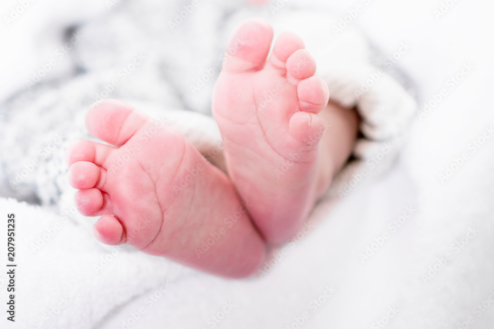 closeup of newborn baby feet. Template for baby book or baby photo album closeup of newborn baby feet. Template for baby book or baby photo album