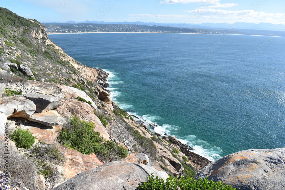 Fototapeta premium Wonderful landscape with the blue beach at the hiking trail at Robberg Nature Reserve in Plettenberg Bay, South Africa