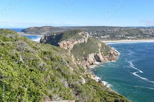 Wonderful landscape with the blue beach at the hiking trail at Robberg Nature Reserve in Plettenberg Bay, South Africa