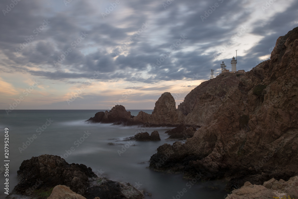 The cabo de gata lighthouse at sunset