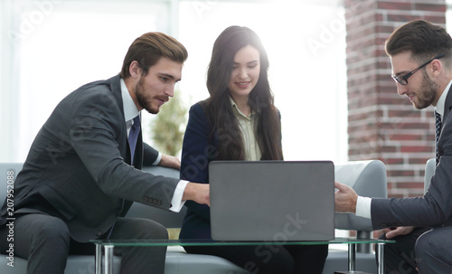 Confident business team working in an office.