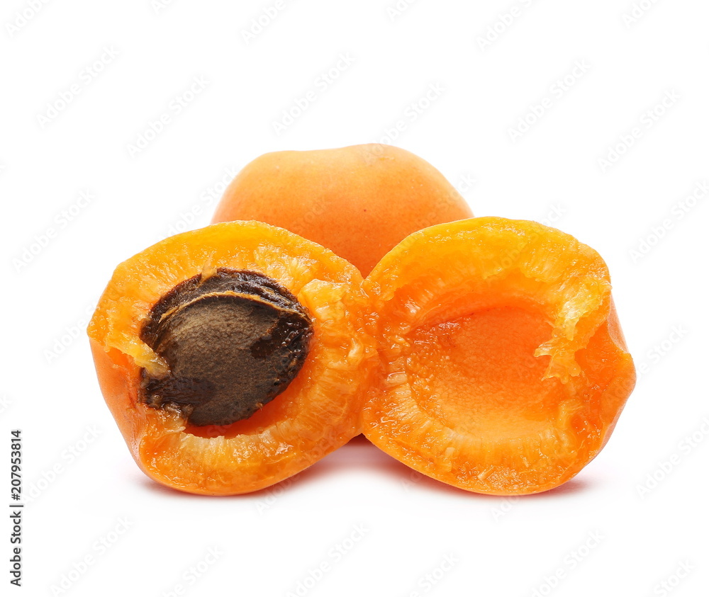 Cut fresh apricot fruits isolated on white background