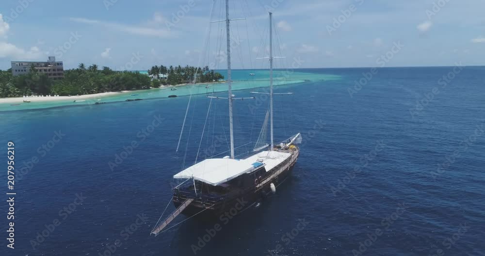 Yacht From Drone, Yacht Sailing On Opened Sea Blue Water. Luxury Lifestyle Scene Yacht From Drone, Yacht Sailing On Opened Sea Blue Water. Luxury Lifestyle Scene