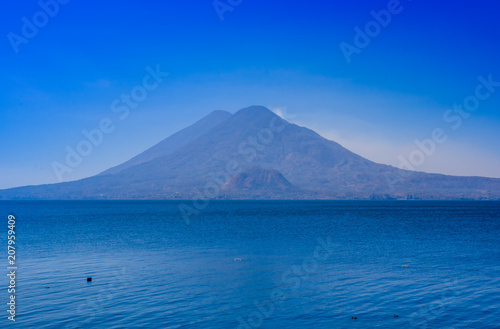 Beautiful landscape of Atitlan Lake, is the deepest lake in all of Central America with a maximum depth of about 340 meters, with volcano in Background