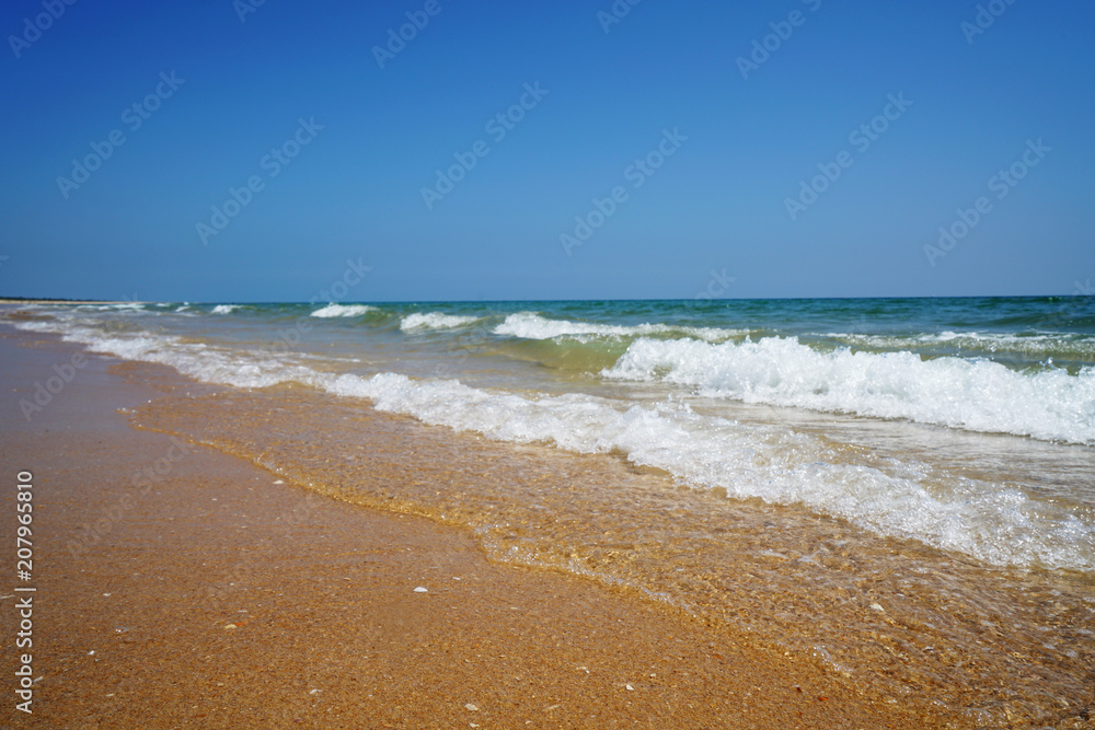 Lonely Atlantic beach in spring in Portugal with light swell
