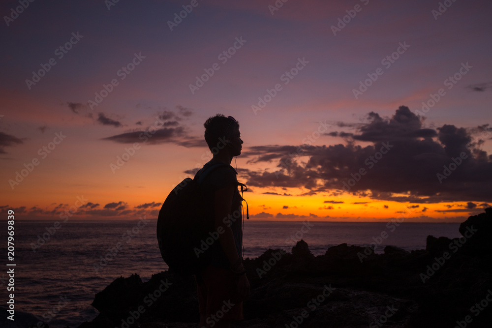 silhouette of a girl at sunset near the ocean silhouette of a girl at sunset near the ocean