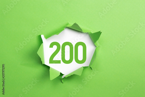 gruene Nummer 200 auf gruenem Papier photo