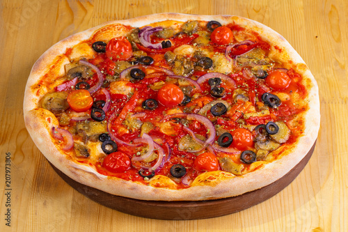 Pizza with mushrooms and tomatoes