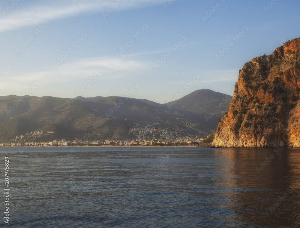 Ocean with cliffs and mountain view