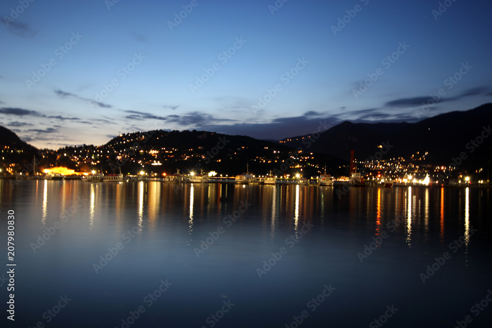 a beautiful picture of the lake by night, lake Como, Italy