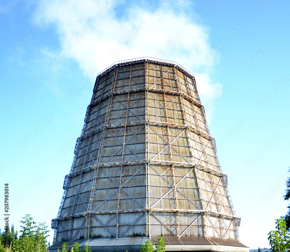 whole entire pipe for cooling water power plants on a clear blue sky