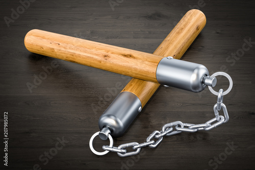Nunchaku on the wooden table, 3D rendering photo