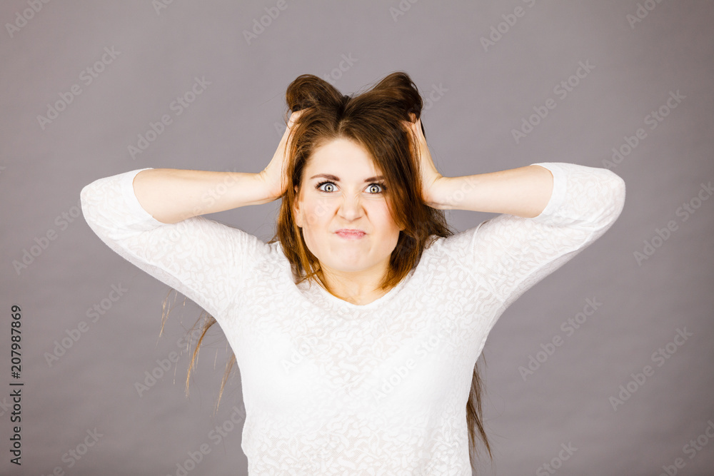 Fototapeta premium Attractive woman having angry frustrated face expression