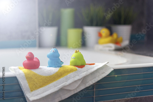 rubber toys in the bathroom, yellow duck and bath decor elements