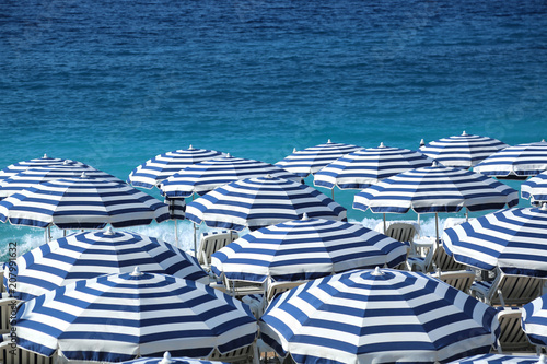 Striped beach umbrellas. Nice, France.