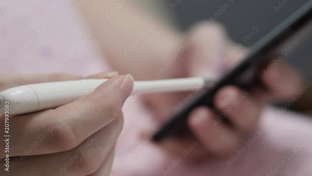 Pregnant Woman Holding A Thermometer And Mobile Phone Pregnant Woman Holding A Thermometer And Mobile Phone
