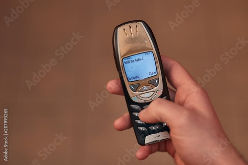 Canvas Print Old Phone Texting