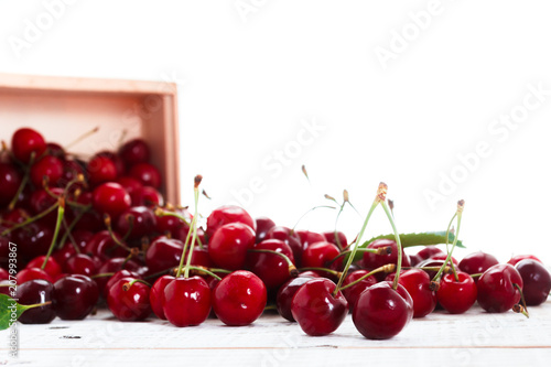 cherry in wooden container ...