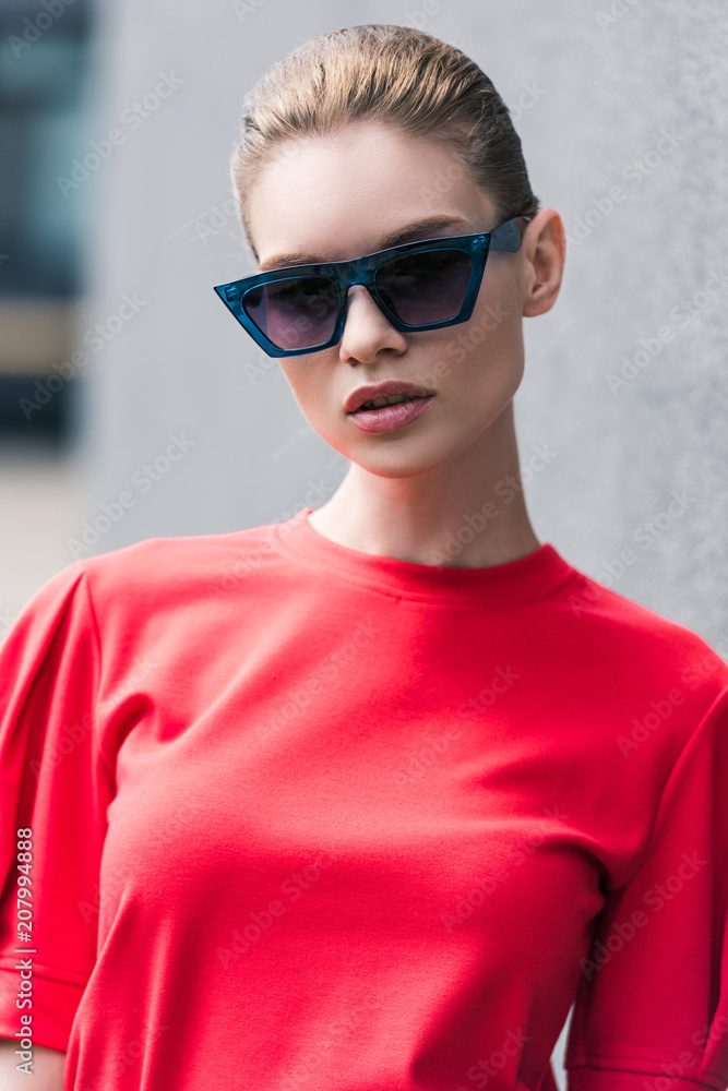 portrait of stylish young female model in sunglasses portrait of stylish young female model in sunglasses
